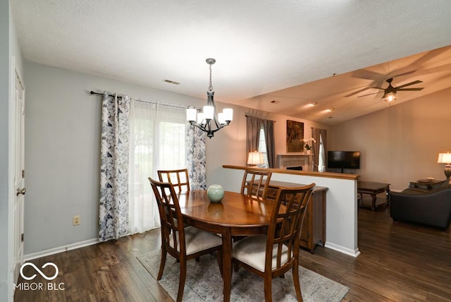 444 Austin Dr, Avon, IN 46123 - dining area featuring wood finished floors, a chandelier, baseboards, and a ceiling fan