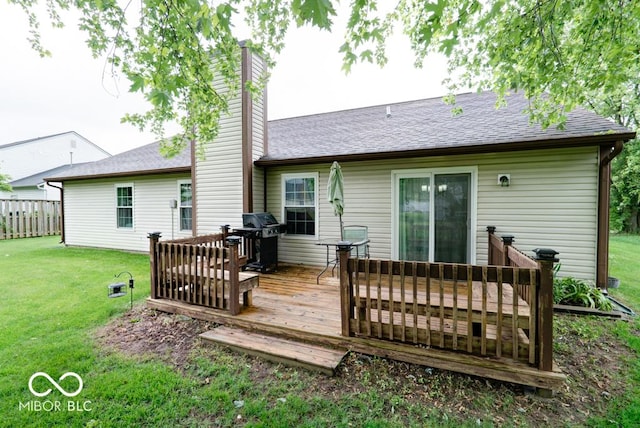 444 Austin Dr, Avon, IN 46123 - back of property featuring a chimney, a yard, a wooden deck, and roof with shingles