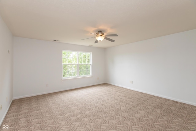 3623 Carroll Farms Dr, Indianapolis, IN 46235 - empty room featuring a ceiling fan, light carpet, and baseboards