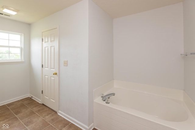 3623 Carroll Farms Dr, Indianapolis, IN 46235 - full bath with a garden tub, baseboards, and tile patterned flooring