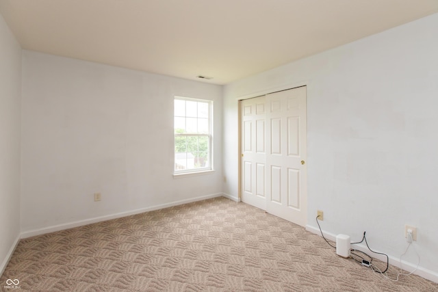3623 Carroll Farms Dr, Indianapolis, IN 46235 - unfurnished bedroom with baseboards, a closet, and carpet floors