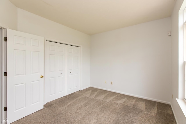 3623 Carroll Farms Dr, Indianapolis, IN 46235 - unfurnished bedroom featuring carpet, baseboards, and a closet