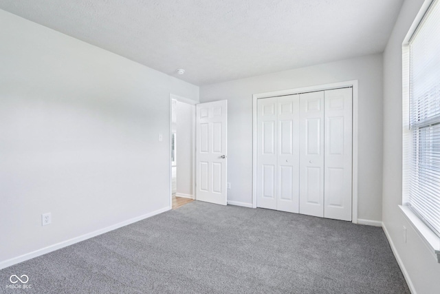 12250 Longstraw Dr, Indianapolis, IN 46236 - unfurnished bedroom with carpet flooring and baseboards