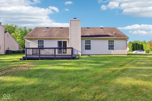 12250 Longstraw Dr, Indianapolis, IN 46236 - rear view of property featuring a wooden deck, a lawn, and a chimney