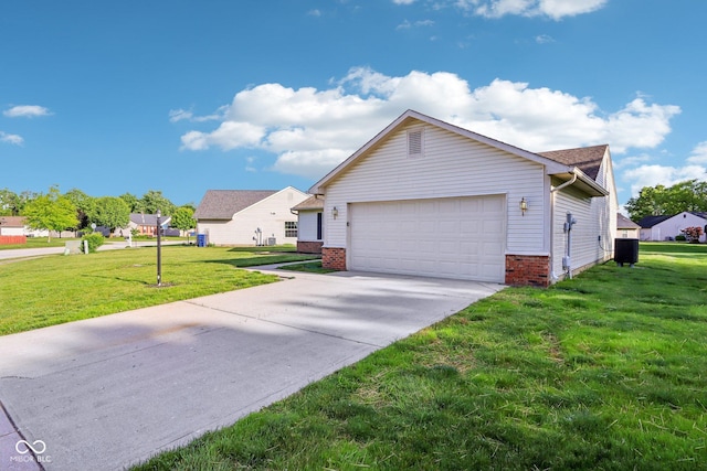 12250 Longstraw Dr, Indianapolis, IN 46236 - view of front of property featuring a garage, driveway, a front lawn, and brick siding