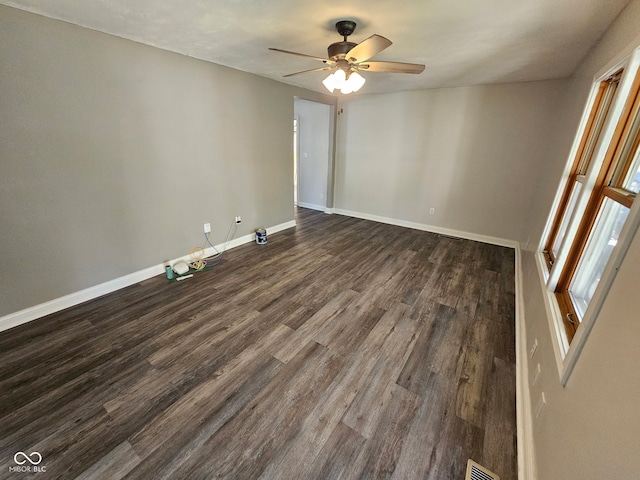 315 Schoolhouse Rd, Franklin, IN 46131 - unfurnished room featuring dark wood-type flooring, a ceiling fan, and baseboards
