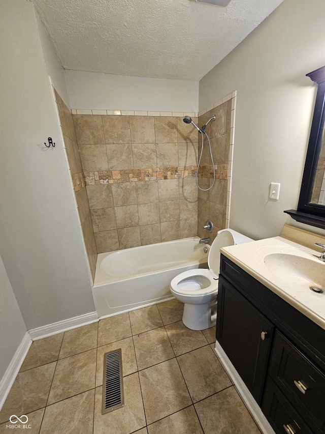 315 Schoolhouse Rd, Franklin, IN 46131 - bathroom featuring vanity, tile patterned flooring, shower / bathtub combination, toilet, and a textured ceiling