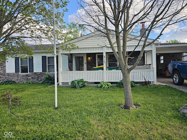 315 Schoolhouse Rd, Franklin, IN 46131 - view of front facade with a chimney, an attached carport, a front lawn, and covered porch