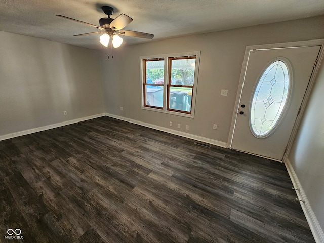 315 Schoolhouse Rd, Franklin, IN 46131 - foyer featuring dark wood-style floors, a ceiling fan, baseboards, and a textured ceiling