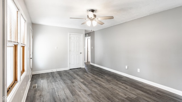 315 Schoolhouse Rd, Franklin, IN 46131 - unfurnished room featuring dark wood-type flooring, ceiling fan, and baseboards