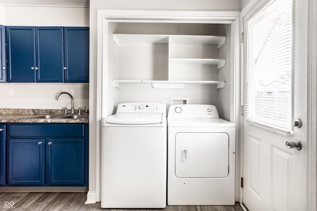 315 Schoolhouse Rd, Franklin, IN 46131 - laundry room with separate washer and dryer, healthy amount of natural light, and wood finished floors