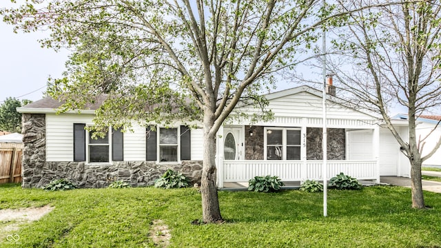 315 Schoolhouse Rd, Franklin, IN 46131 - view of front of house with stone siding and an attached garage