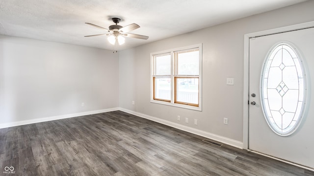 315 Schoolhouse Rd, Franklin, IN 46131 - foyer entrance with dark wood-type flooring, ceiling fan, and baseboards