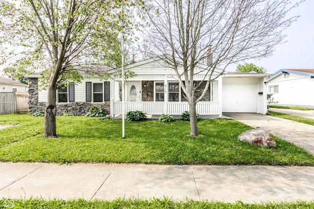 315 Schoolhouse Rd, Franklin, IN 46131 - ranch-style house with stone siding, covered porch, an attached garage, concrete driveway, and a chimney