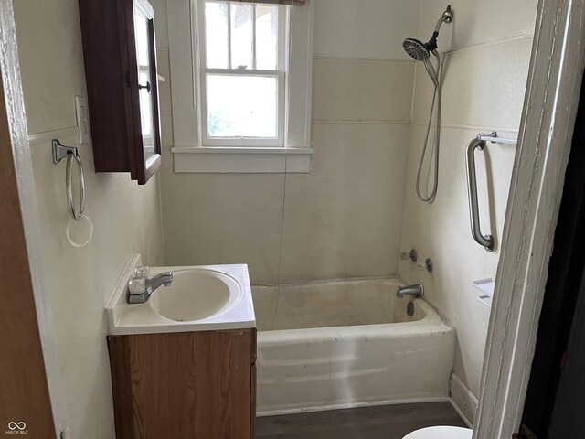 1020 E 30th St, Anderson, IN 46016 - bathroom featuring vanity, shower / bath combination, and toilet
