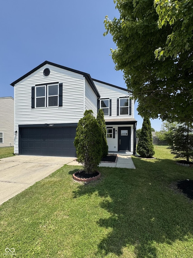 3327 Brandenburg Blvd, Indianapolis, IN 46239 - view of front facade with a garage, driveway, and a front yard