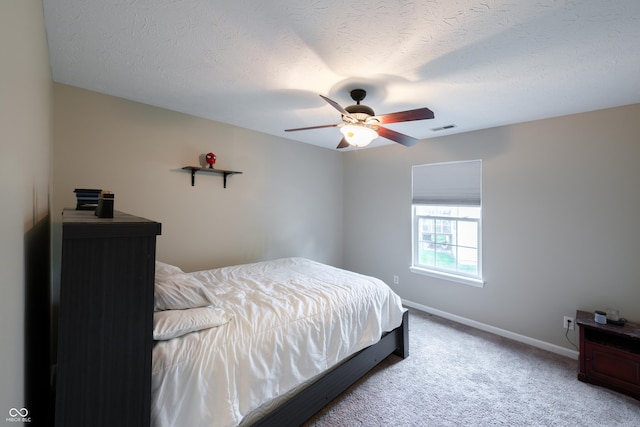 13271 Aquamarine Dr, Carmel, IN 46033 - carpeted bedroom featuring ceiling fan and a textured ceiling