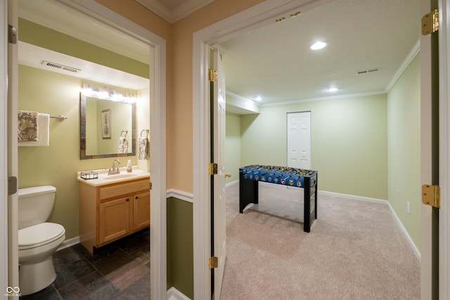 13271 Aquamarine Dr, Carmel, IN 46033 - rec room featuring ornamental molding, recessed lighting, and dark colored carpet