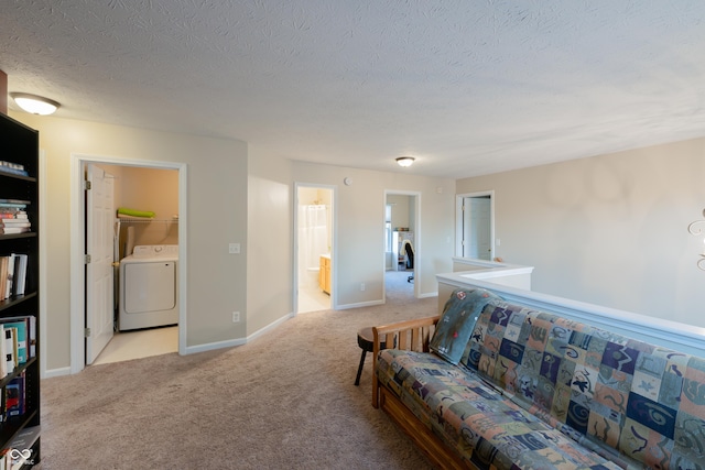 13271 Aquamarine Dr, Carmel, IN 46033 - living room featuring washer / dryer, light carpet, and a textured ceiling