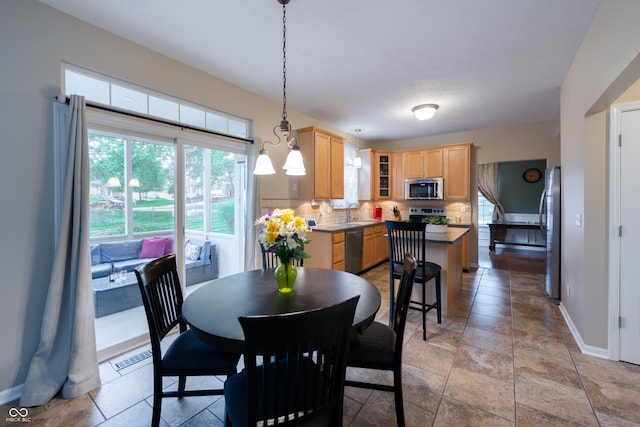 13271 Aquamarine Dr, Carmel, IN 46033 - dining area with baseboards