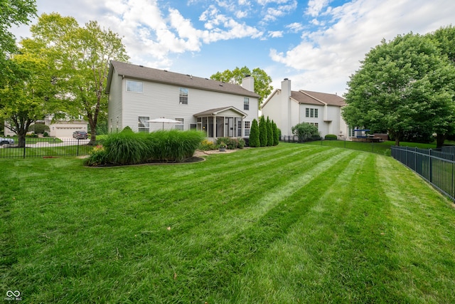 13271 Aquamarine Dr, Carmel, IN 46033 - rear view of property featuring a chimney