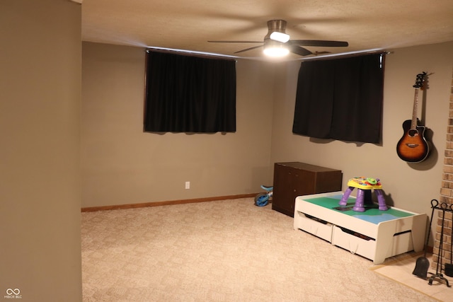 651 N 900 E, Lafayette, IN 47905 - rec room with ceiling fan, light colored carpet, and baseboards