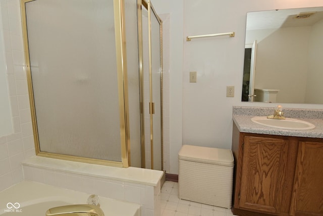 4528 Hunt Master Ct, Indianapolis, IN 46268 - bathroom featuring a garden tub, vanity, a shower stall, and toilet