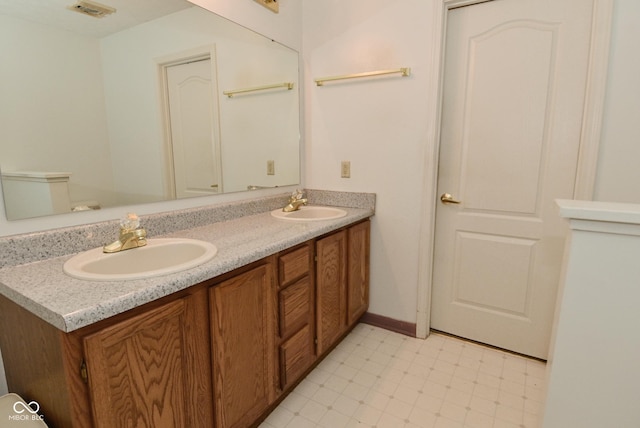 4528 Hunt Master Ct, Indianapolis, IN 46268 - full bathroom with double vanity and toilet
