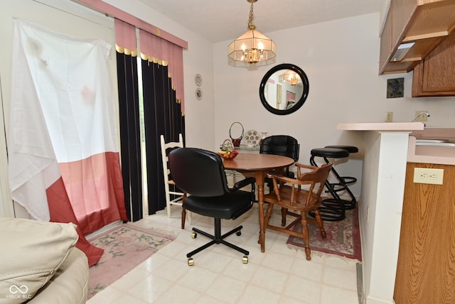 4528 Hunt Master Ct, Indianapolis, IN 46268 - dining room with light flooring and a chandelier