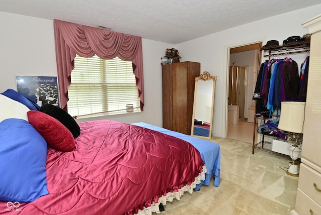 4528 Hunt Master Ct, Indianapolis, IN 46268 - carpeted bedroom featuring a textured ceiling