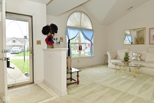 4528 Hunt Master Ct, Indianapolis, IN 46268 - carpeted entrance foyer with lofted ceiling and baseboards