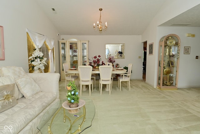 4528 Hunt Master Ct, Indianapolis, IN 46268 - dining space featuring lofted ceiling, a chandelier, carpet floors, and baseboards