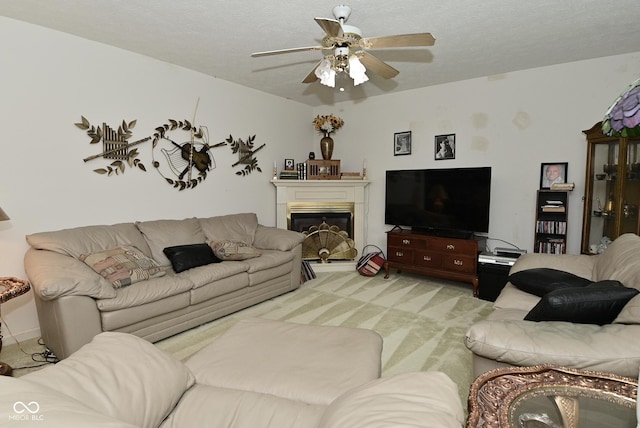 4528 Hunt Master Ct, Indianapolis, IN 46268 - living area with ceiling fan, carpet floors, and a glass covered fireplace