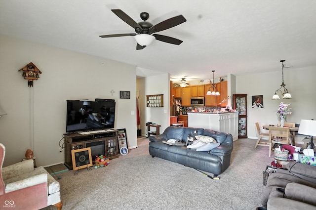 17233 Gunther Blvd Unit 102B, Westfield, IN 46074 - living area with a chandelier, a ceiling fan, and carpet floors
