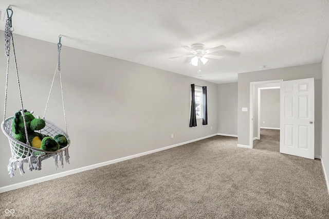 6645 Honeysuckle Way, Pendleton, IN 46064 - unfurnished room with a ceiling fan, carpet flooring, and baseboards