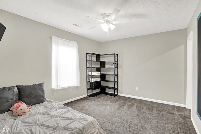 6645 Honeysuckle Way, Pendleton, IN 46064 - bedroom featuring carpet, baseboards, a ceiling fan, and a textured ceiling