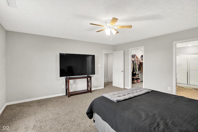 6645 Honeysuckle Way, Pendleton, IN 46064 - bedroom with a spacious closet, baseboards, a closet, and ensuite bathroom