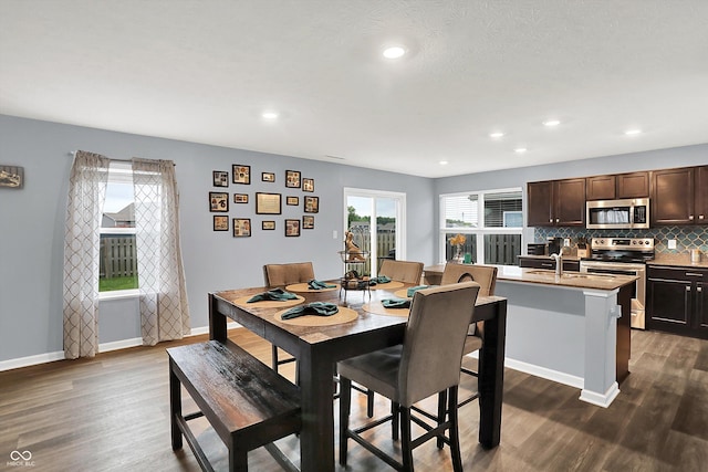 6645 Honeysuckle Way, Pendleton, IN 46064 - dining space with dark wood-type flooring, baseboards, and recessed lighting