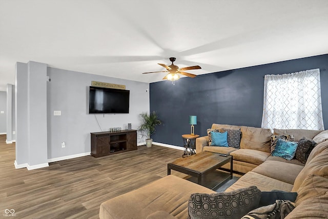 6645 Honeysuckle Way, Pendleton, IN 46064 - living room featuring a ceiling fan, wood finished floors, and baseboards