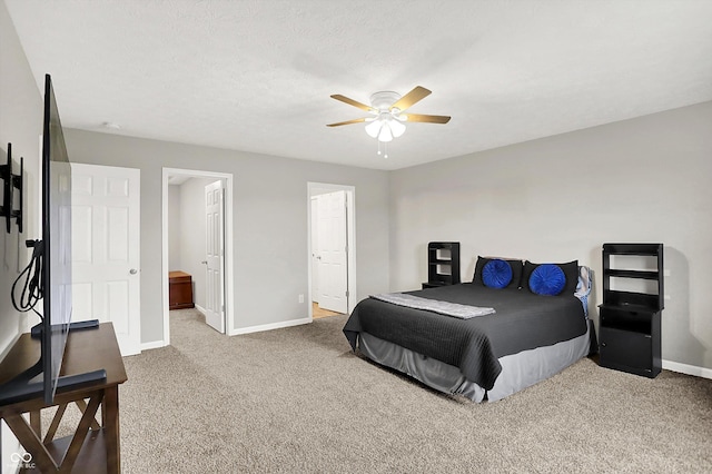 6645 Honeysuckle Way, Pendleton, IN 46064 - bedroom with baseboards, carpet, and a ceiling fan
