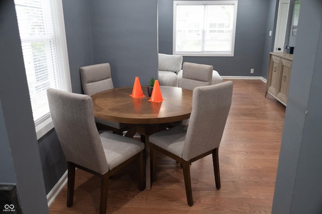 1331 N Berwick Ave, Indianapolis, IN 46222 - dining room with light wood finished floors and baseboards