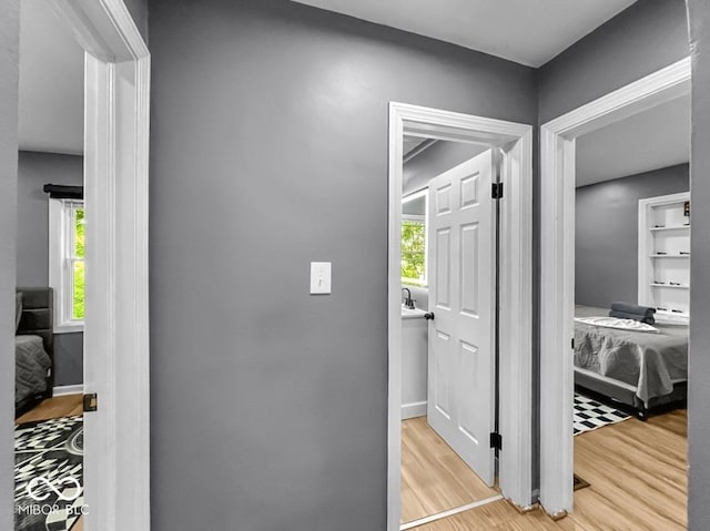 1331 N Berwick Ave, Indianapolis, IN 46222 - hall with light wood-style floors