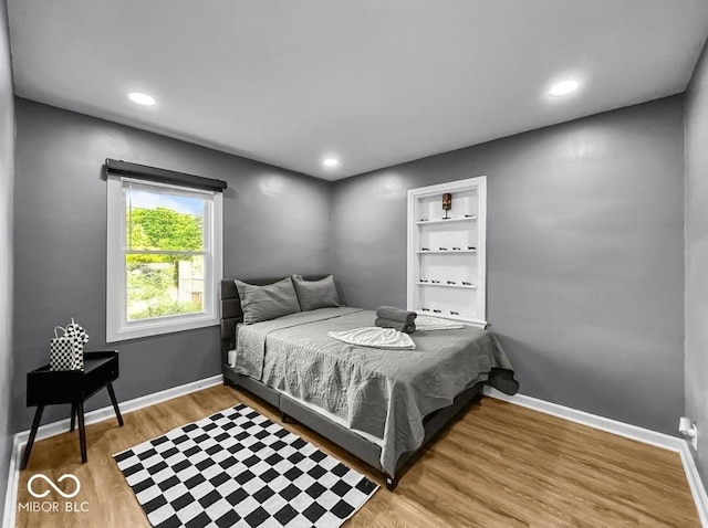1331 N Berwick Ave, Indianapolis, IN 46222 - bedroom with wood finished floors and recessed lighting