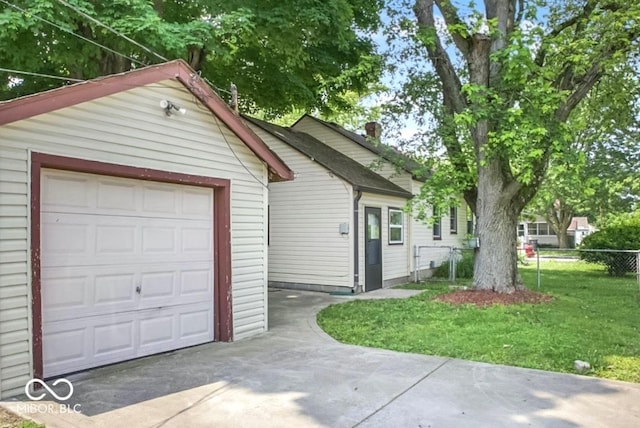 1331 N Berwick Ave, Indianapolis, IN 46222 - ranch-style house featuring driveway, an outdoor structure, and a garage
