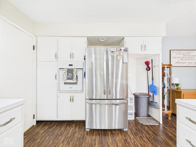 5542 N Olivia Dr, Alexandria, IN 46001 - kitchen featuring freestanding refrigerator, oven, dark wood-style floors, white cabinets, and light countertops