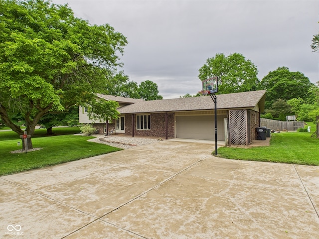 5542 N Olivia Dr, Alexandria, IN 46001 - view of front facade with a garage, driveway, brick siding, and roof with shingles