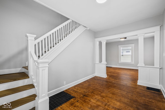 3227 Guilford Ave, Indianapolis, IN 46205 - staircase featuring wood finished floors and baseboards