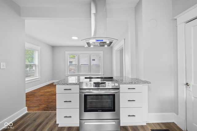 3227 Guilford Ave, Indianapolis, IN 46205 - kitchen featuring electric stove, island range hood, light stone countertops, and dark wood-type flooring