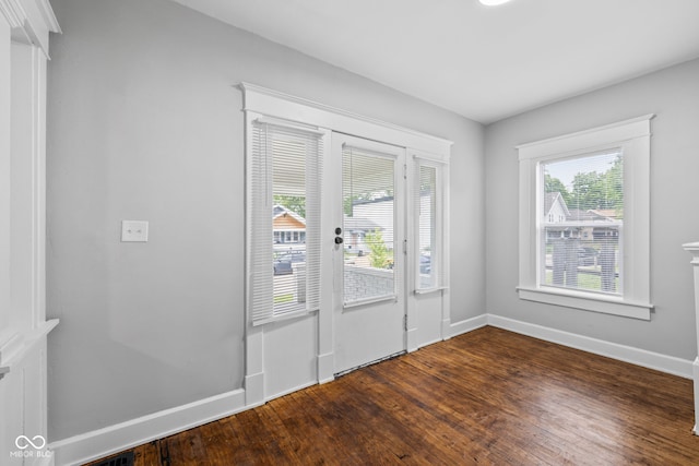 3227 Guilford Ave, Indianapolis, IN 46205 - doorway featuring wood finished floors and baseboards