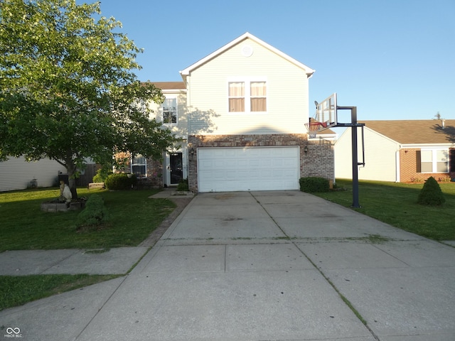 8609 Wheatfield Dr, Camby, IN 46113 - view of front of home with a front lawn, driveway, a garage, and brick siding